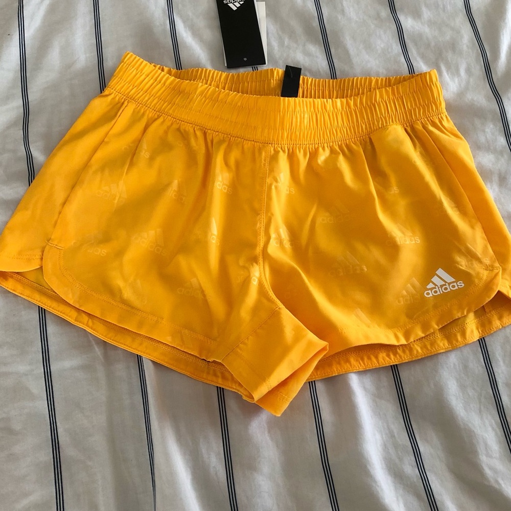 Adidas logo athletic shorts yellow